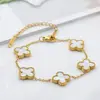 Bestseller transfronterizo pulsera de trébol de 13 mm en color oro de 18 quilates con nácar a doble cara, nuevo estilo de moda, pulsera versátil y elegante
