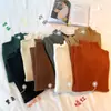 Suéter de cuello alto medio para mujer, adecuado para usar en capas, estilo nuevo Otoño/Invierno 2025, elegante, grueso, corte ajustado, tejido versátil