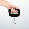 Balanza Portátil Mini Balanza para Maletas Balanza Electrónica de Pesaje 50kg Balanza Doméstica Balanza Portátil con Gancho