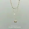 Collar Multicapa con Colgante de Corazón Dorado Estilo Medieval para Mujer Diseño de Nicho Cadena para Clavícula de Perlas de Moda