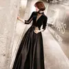 Vestido de Noche 2026 Nuevo Estilo Banquete Moda Vestido Cuello en V Largo Negro Sexy Vestido de Anfitrión para Reunión Anual para Mujeres