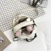 Bolso pequeño cuadrado al por mayor estilo Harajuku japonés para mujer, nuevo modelo verano 2026, bolso de hombro simple combinado, bolso cruzado de moda
