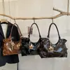 Bolso Nicho Estilo Coreano para Mujer 2026 Nuevo Invierno Gran Capacidad Bolso Cruzado Exquisito Súper Popular Versátil Bolso de Hombro Tote
