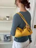 Outono/Inverno 2026 Novo Estilo Coreano Simples Moda Retrô Bolsa de Mão para o Trabalho Tendência Versátil Bolsa de Ombro Único para Sobrancelha