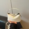 Bolsa de Mão Super Popular para Escritório para Mulheres, Nova Tendência Primavera/Verão 2026, Bolsa de Ombro Transversal Exquisita de Alta Qualidade para o Dia a Dia