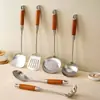 Spot al por mayor acero inoxidable 304 juego de utensilios de cocina espátula mango de palisandro colador engrosado aislamiento térmico espátula para cocinar freír pescado