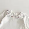 Ropa Nueva de Otoño 2025 para Niñas Camiseta Básica de Manga Larga para Bebé Cuello de Muñeca Bordado Camiseta Exterior Versátil