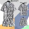 Camisa de Praia Masculina Ins Verão Solta Manga Curta Conjunto de Shorts Tendência e Bonito Roupa Floral de Praia para Casal
