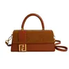 Bolso cuadrado pequeño retro de estilo coreano, moderno y único, para mujer, adecuado para ir al trabajo, con un distintivo toque casual y de alta gama, nuevo modelo cruzado y de mano