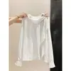 Camisa sin mangas de lunares estilo coreano para mujer, principios de otoño, con un dobladillo asimétrico de volantes, estilo holgado y casual