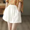 Pantalones casuales retro de algodón y lino para mujer, con cintura elástica, efecto adelgazante, pierna ancha, bordado artístico, corte holgado y diseño versátil para el verano