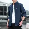 Novas Camisas Sociais Masculinas para Primavera e Outono 2025 Sem Ferro Tendência Casual Slim Fit Retro Cor Sólida Manga Longa Camisas Masculinas