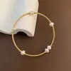 Pulsera Sencilla y Exquisita de Perla de Agua Dulce Zhuji en Forma de Gota, Pulsera Hecha a Mano Envuelta en Alambre de Cobre Dorado, Mayorista Fabricante de Joyería