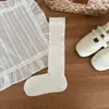 Calcetines de canalé de ángulo recto de color sólido para otoño e invierno, calcetines de compresión simples sin costuras estilo coreano para mujer, algodón puro, venta al por mayor de la industria del calcetín de Zhuzji