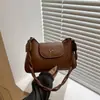 Bolsas de Nicho Super Populares para Mulheres Deste Ano 2025 Nova Bolsa Transversal Versátil de Verão Bolsa de Axila de Ombro Único de Alta Qualidade