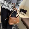Bolso de Hombro Texturizado de Color Sólido de Moda para Mujer 2026 Nuevo Estilo Casual de Media Luna con Lazo Bolso Versátil