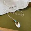 Collar con colgante de estrella de mar y pez mate esmerilado para mujer, nicho de lujo ligero con un toque de alta gama, cadena para la clavícula, cadena de suéter moderna y versátil