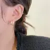 Pendientes de aro dobles franceses para mujer, diseño de nicho, pendientes avanzados de otoño e invierno 2024, nuevos pendientes de moda para mujer.