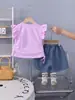 Conjunto de Dos Piezas de Nuevo Estilo Veraniego para Niñas: Camisetas de Manga Corta y Shorts de Mezclilla con Lindo Estampado de Conejo para el Verano de los Niños