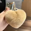 Lindo llavero de coche con forma de corazón de pelo de nutria, bola de felpa de moda, charm de mochila con forma de corazón, regalo