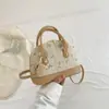 Bolsa de Mão Nova Moda Primavera 2026 Estilo Étnico Bolsa de Concha Elegante Bolsa de Ombro Casual Simples Bolsa Transversal