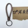 Cordón de cuero simple cuerda redonda PU llavero soporte para llaves de coche accesorio colgante para bolso anillo redondo colgante de regalo