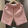 Shorts Esportivos Masculinos de Secagem Rápida Novos para o Verão de 2026, Corte Solto, Marca Tendência, Shorts Casuais Versáteis de Cor Sólida para Jovens