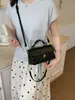 Bolso de mujer transfronterizo, exquisito bolso de hombro con patrón de diamantes, nuevo bolso de mano patchwork de hebilla de bloqueo de alta gama de Henggeng, elegante bolso cruzado
