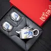 Juego de té de plata dorada, una tetera y dos tazas, juego de té kung fu de viaje portátil de servicio rápido, caja de regalo, adecuado para regalar a personas mayores durante el Festival del Medio Otoño y el Día Nacional