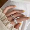 Anillo de Diseño de Nicho Estilo Coreano para Mujer con Lazo Hueco Ojo de Gato Anillo de Viento Frío Versátil Moda Nueva 2024