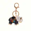 Muestras personalizadas para mapear colgante transfronterizo elefante aleación llavero Lazada collar personalizado broche fábrica procesamiento