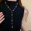 Nuevo collar de perlas artificiales de doble capa apiladas, exquisita cadena de clavícula de moda transfronteriza, elegante cadena de lana ligera de lujo francesa