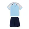 Uniformes escolares hechos a medida para estudiantes de primaria y secundaria, de manga corta para verano, chaquetas para primavera y otoño, trajes deportivos, escudos escolares bordados a medida