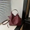Bolso Cruzado de Cubo de Agua Transfronterizo para Mujer 2026 Otoño/Invierno Nuevo Versátil Bolso de Hombro Cruzado de Mano de Alta Gama para Viaje de Negocios Bolso para Mujer