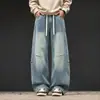 Vibras de Streetwear Americano Jeans Retro Desgastados Hombre Otoño Otoño Sueltos Color Sólido Pierna Recta Ligera Campana Adelgazantes Pantalones Largos Modernos