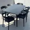 Conjunto de mesa redonda pequena e cadeiras de aço carbono para varanda, estilo casual e moderno, para cafeteria e loja de chá com leite, mesa de jantar externa