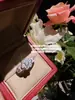 Joyas generosos pendientes de flor de esmalte de gota de agua traje de anillo de corona de taro de ensueño chapado en oro circón