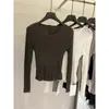 Elegante top de punto de manga larga con botones en la espalda y diseño calado, nuevo estilo de otoño 2026 para mujer, camiseta básica adelgazante con espalda abierta