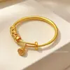 Transmisión en vivo fuente arena oro tallado vaina de loto pulsera método antiguo pulsera de estilo push-pull de vientre redondo moderno para mujer venta al por mayor