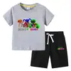 Camiseta infantil de verano 2023, nueva ropa infantil de comercio exterior, pantalones de manga corta de algodón coreano para niños, traje de dos piezas