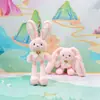 Jinnew Original Nuevo Estilo Chino Divertido Colgante de Peluche de Conejo Desplegable Llavero de Conejo de Orejas Tirables Muñeca Venta al por Mayor