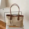 2026 Nova Bolsa de Palha Tecida para Mulheres Bolsa de Ombro de Bloco de Cores de Alta Qualidade Grande Capacidade Bolsa de Mão Moderna Versátil