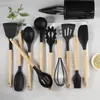 Amazon Más Vendido Cubo de Almacenamiento Negro Caqui Mango de Madera Utensilios de Cocina de Silicona Juego de 11 Piezas Utensilios de Cocina Juego para Cocinar
