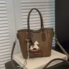 Bolsas de Gama Alta de Nicho en Colores Contrastantes para Mujer 2025 Nuevas de Moda Tendencia Bolsos de Hombro Versátiles Bolsos Cruzados tipo Cubo