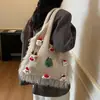 Bolsa Feminina Fofa da Moda 2025 Nova Bolsa de Ombro Grande Capacidade para o Dia a Dia Bolsa de Tricô Bolsa Tote Casual