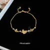 Colgante de Flor Hueca Ovalada de Corazón de Zircón Pulsera Deslizante Pulsera de Lujo Ligero de Gama Alta Pulsera de Moda Versátil
