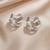 Nuevos Pendientes Europeos y Americanos de Acero de Titanio para Mujer Moda de Alta Gama Pendientes Geométricos Empalmados Pendientes Transfronterizos de Acero Inoxidable Venta al Mayoreo al Contado