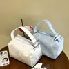 2026 Novo Modelo Alta Aparência Desenho Animado Portátil Bolsa de Armazenamento para Maquiagem e Artigos de Higiene Pessoal Viagem Simples Grande Capacidade Bolsa de Mão Tridimensional
