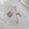 Reloj de Pulsera Extraíble con Esfera de Trébol de Cuatro Hojas Incrustado de Diamantes, Dulce y Fresco, de Moda, Lujo Ligero y Diseño de Gama Alta, Reloj Nuevo