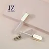 Tubo personalizado de fábrica para brillo de labios cuadrado con anillo central, tubo de color para labios de 6 ml, tubo vacío de plástico, material para bolsa de maquillaje